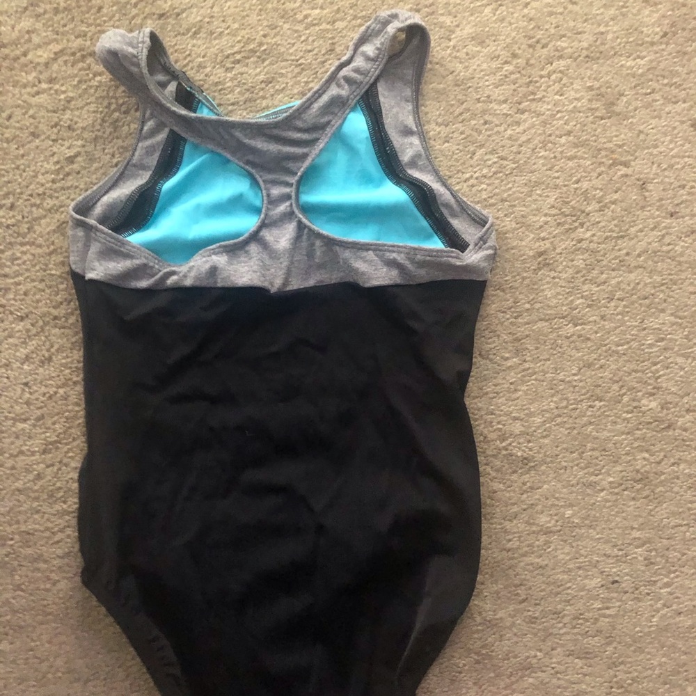 GK racerback leotard black and turquoise. AS